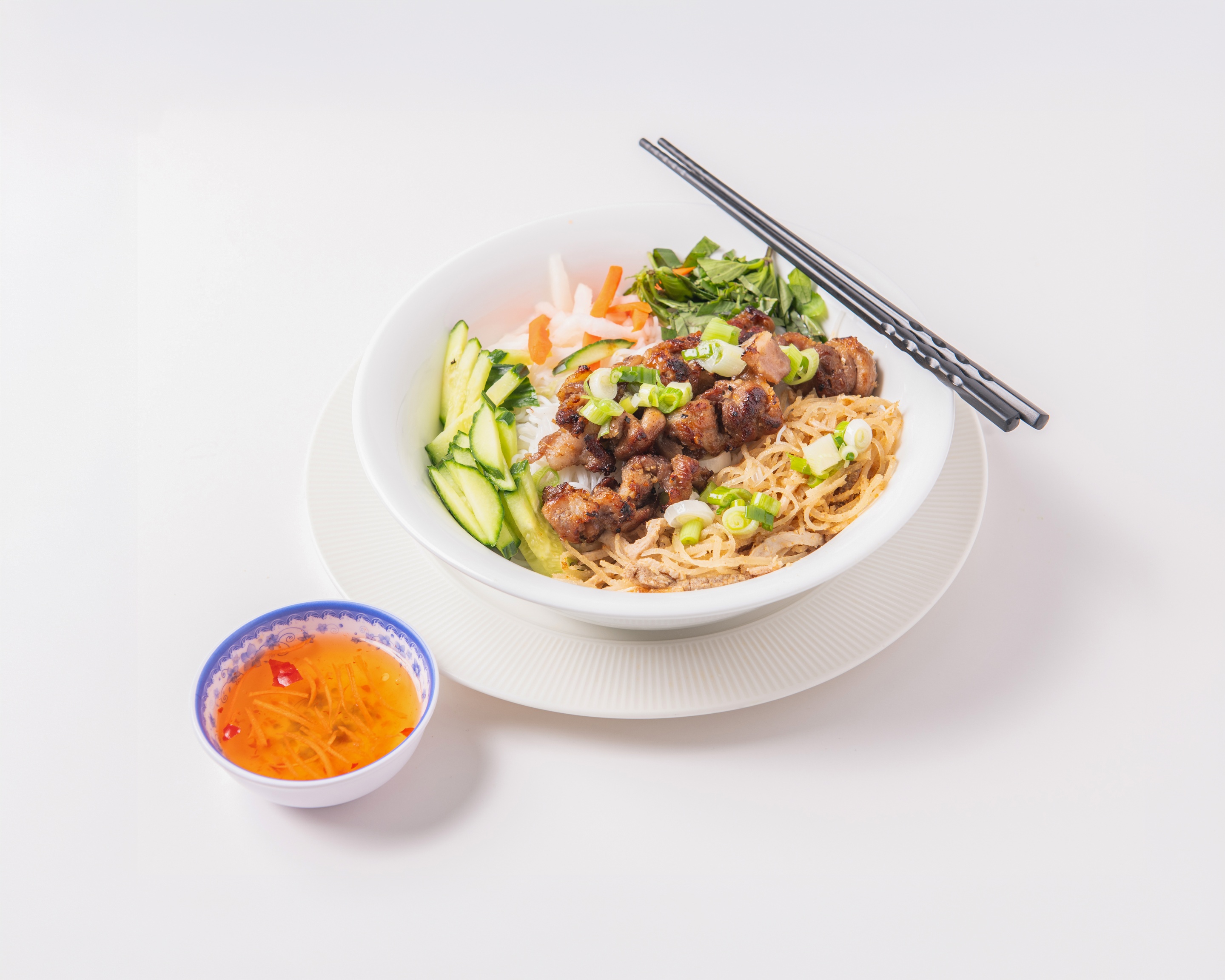 Bún Bì Thịt Nướng (Bun Bi Thit Nuong) - Skewered pork and shredded pork skin on vermicelli with assorted vegetables