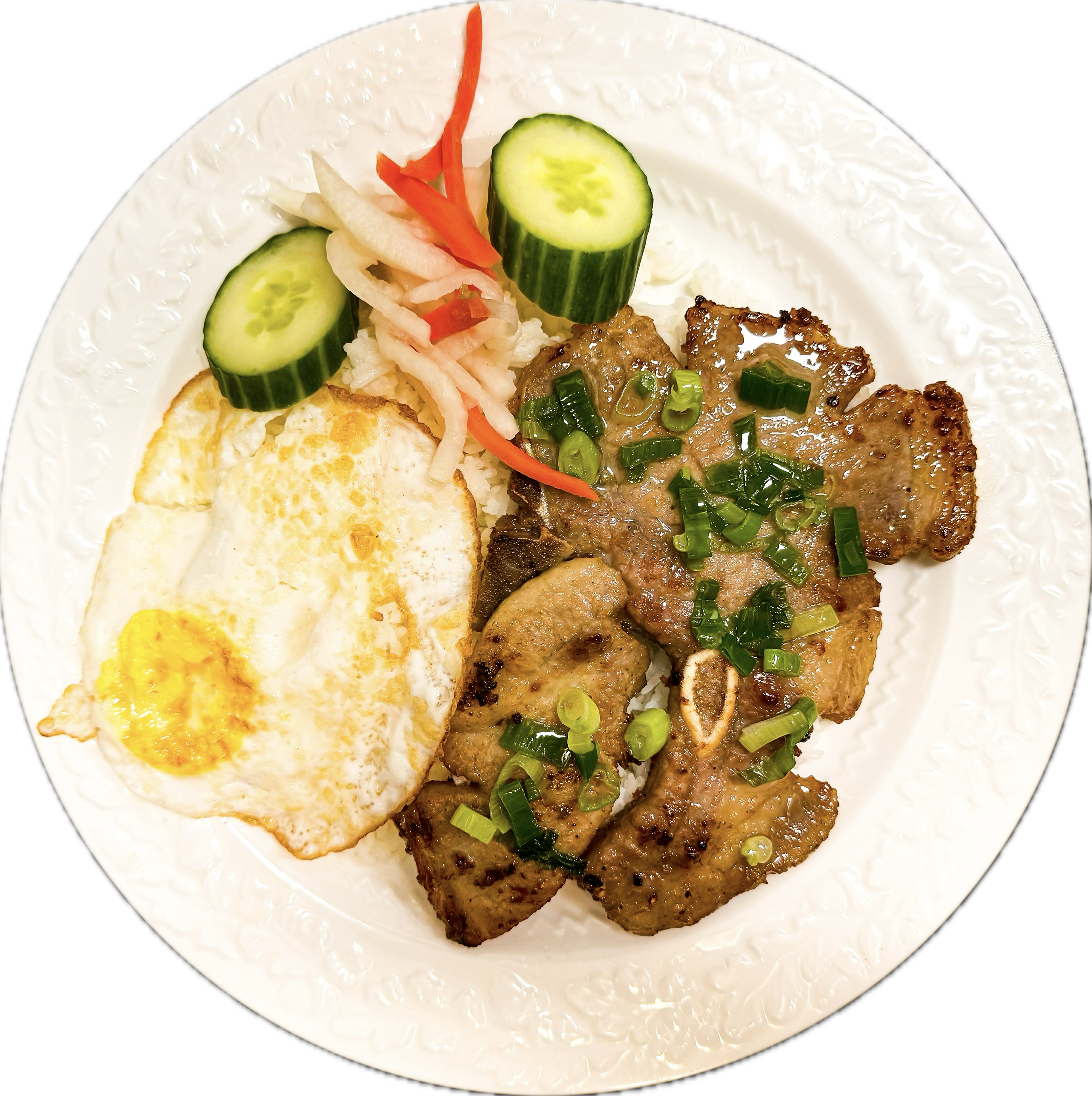 Cơm Tấm Sườn Trứng (Com Tam Suon Trung) - Grilled pork chop with an egg on steamed broken rice
