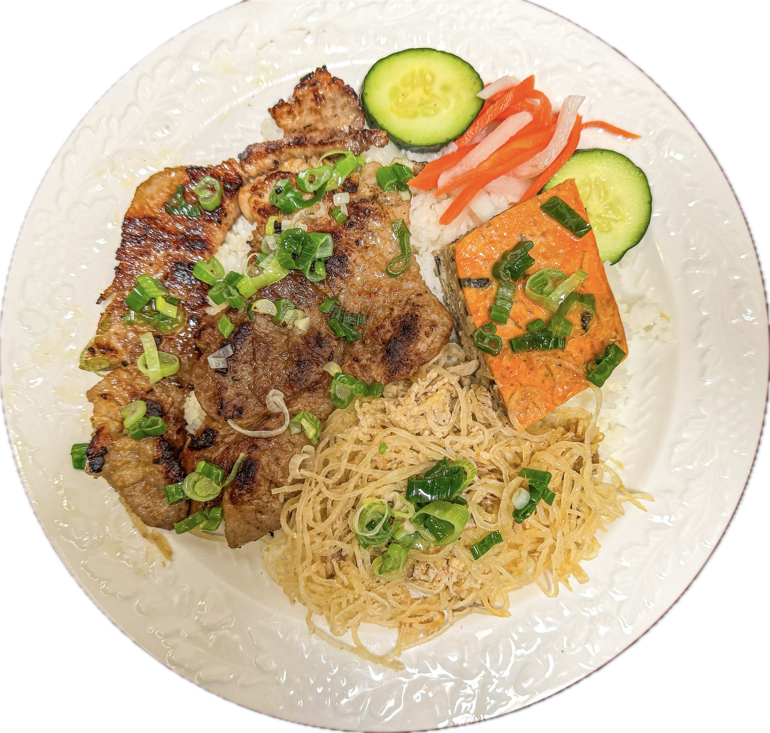 Cơm Tấm Bì Sườn Chả Hấp (Com Tam Bi Suon Cha Hap) - Grilled pork chop, shredded pork skin, and steamed egg meatloaf on steamed broken rice